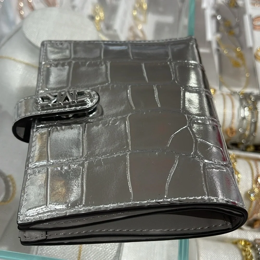 Michael Kors Empire Metallic Crocodile Embossed Leather Passport Wallet Silver